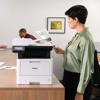 Woman using Brother MFC-L5717DW wireless all-in-one laser printer in modern office