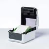 Brother TD-4410D label printer with open cover showing label roll and thermal print mechanism
