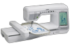 Brother VM5100 embroidery machine with touchscreen and blue floral design in hoop