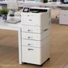 Brother color laser printer with multi-drawer tower in modern office workspace