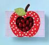 Brother red apple-shaped photo frame with white polka dots holding family photos