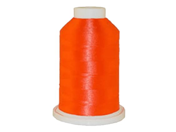 Bright orange embroidery thread spool on white background