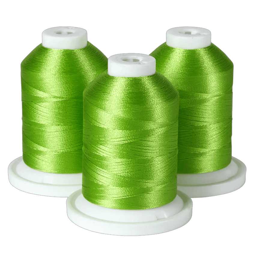 Three green embroidery thread spools on white bases for Brother sewing machines