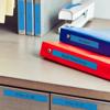 Brother wireless label maker organizing office binders and file drawers on desk