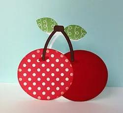 Brother Creative Fabric Piercing Tool red cherry-shaped case with white polka dots
