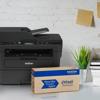 Brother DCP-L2550dw all-in-one laser printer with Refresh toner subscription box on desk