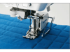 Brother sewing machine presser foot quilting blue fabric with diamond pattern