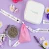 Brother P-touch Embellish label maker with pink satchel, ribbons, and floral decorations