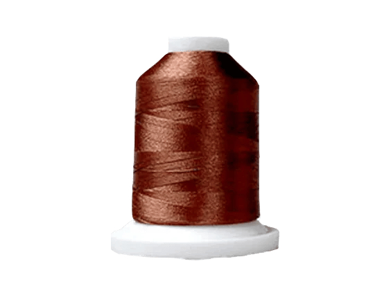 Brother embroidery thread spool in copper brown on white cone