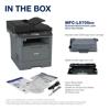Brother MFC-L5705DW monochrome laser all-in-one printer with toner cartridge, drum unit, and accessories