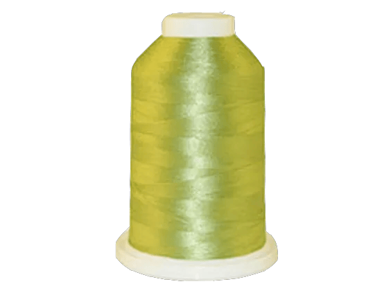 Brother yellow-green embroidery thread spool with white cap on transparent base