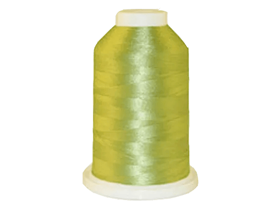 Brother yellow-green embroidery thread spool with white cap on transparent base