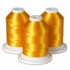 Three spools of golden yellow embroidery thread on white bases