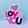 Colorful I love you sticker with purple heart and pink, purple, and black letters