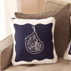 Brother PE800 embroidery machine decorative pear design stitched on navy pillow