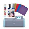 Brother ScanNCut DX cutting machine with vinyl sheets, transfer paper, and auto blade bundle