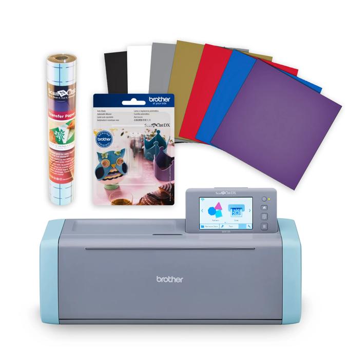 Brother ScanNCut DX cutting machine with vinyl sheets, transfer paper, and auto blade bundle