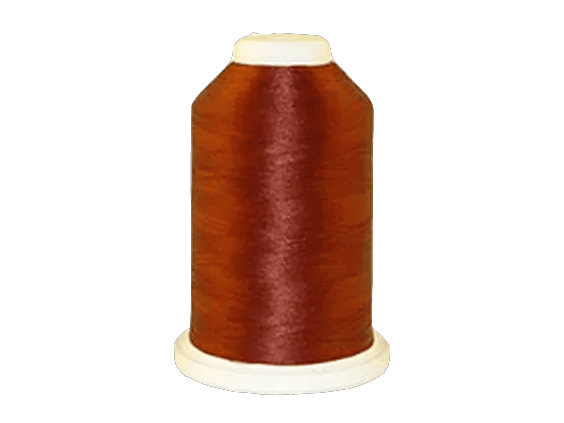 Brother embroidery thread spool in rust brown color on white background