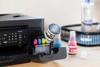 Impresora multifunción Brother MFC-T930DW con tanques de tinta recargables en escritorio