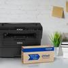 Brother HL-L2395dw monochrome laser printer with Refresh toner subscription box on desk