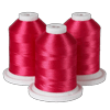 Three spools of red embroidery thread on white bases for Brother sewing machines