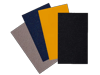 Four overlapping anti-slip mats in gray, navy, yellow, and black colors