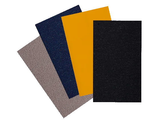 Four overlapping anti-slip mats in gray, navy, yellow, and black colors
