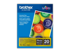 Brother Premium Plus glossy photo paper package with colorful paint cans, 8.5x11 inches, 20 sheets