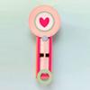 Brother ScanNCut decorative safety pin craft with pink heart medallion and layered ribbons