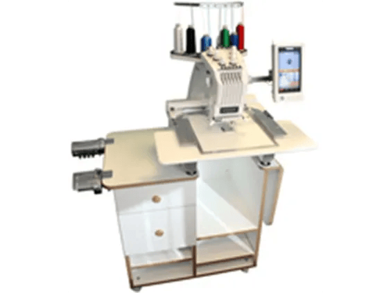 Brother embroidery machine with touchscreen on custom table with storage drawers