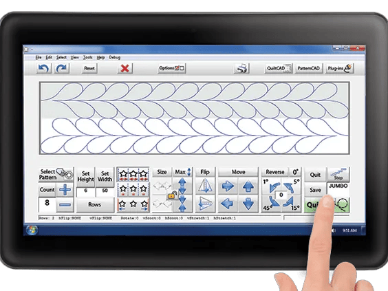 Hand using Brother quilting software on tablet displaying decorative stitch patterns
