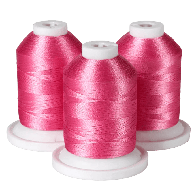 Three pink embroidery thread spools on white bases for Brother sewing machines