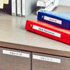 Brother P-touch labeled binders and file drawers on organized office desk