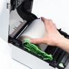 Hand loading label roll into Brother desktop label printer with easy-access media compartment