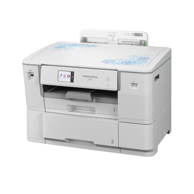 Brother fabric printer with touchscreen and cutting attachment displaying blue floral pattern