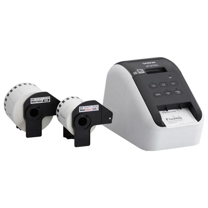 Brother QL-810W wireless label printer with two label rolls printing shipping label