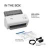 Brother ADS-4300N desktop scanner with setup guides, USB cable, and AC adapter