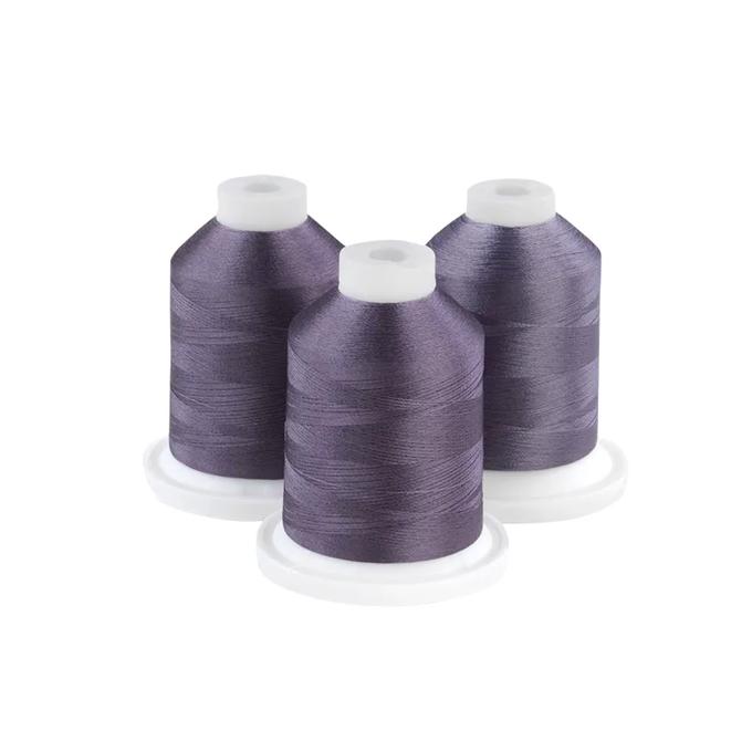 Brother embroidery thread spools in satellite grey on white background