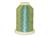 Brother embroidery thread spool in iridescent blue-green with glossy finish on beige base