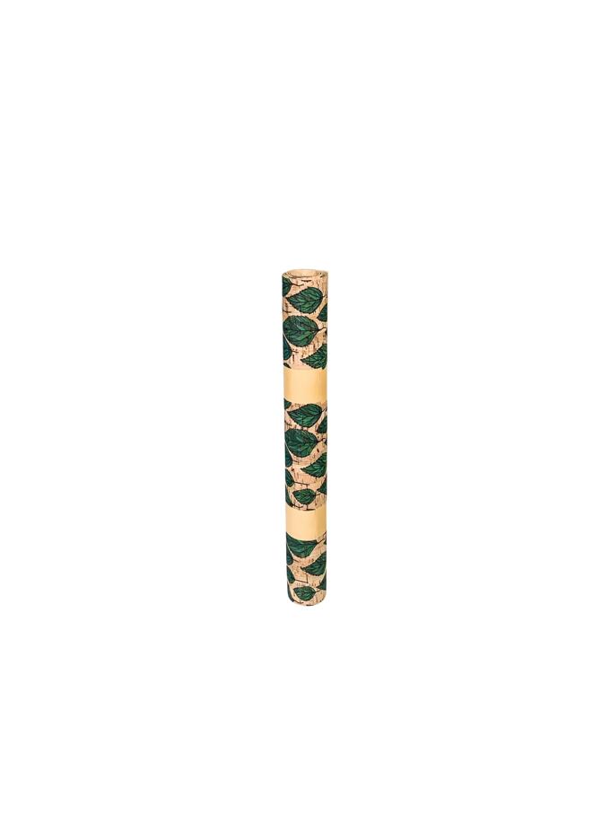 Cork fabric roll with green leaf pattern for sewing and crafting projects