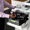 Person replacing toner cartridge in Brother HL-L9430CDN color laser printer