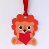 Brother ScanNCut craft project: paper lion ornament with red heart and ribbon