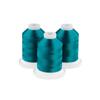 Three spools of oceanic green embroidery thread on white bases