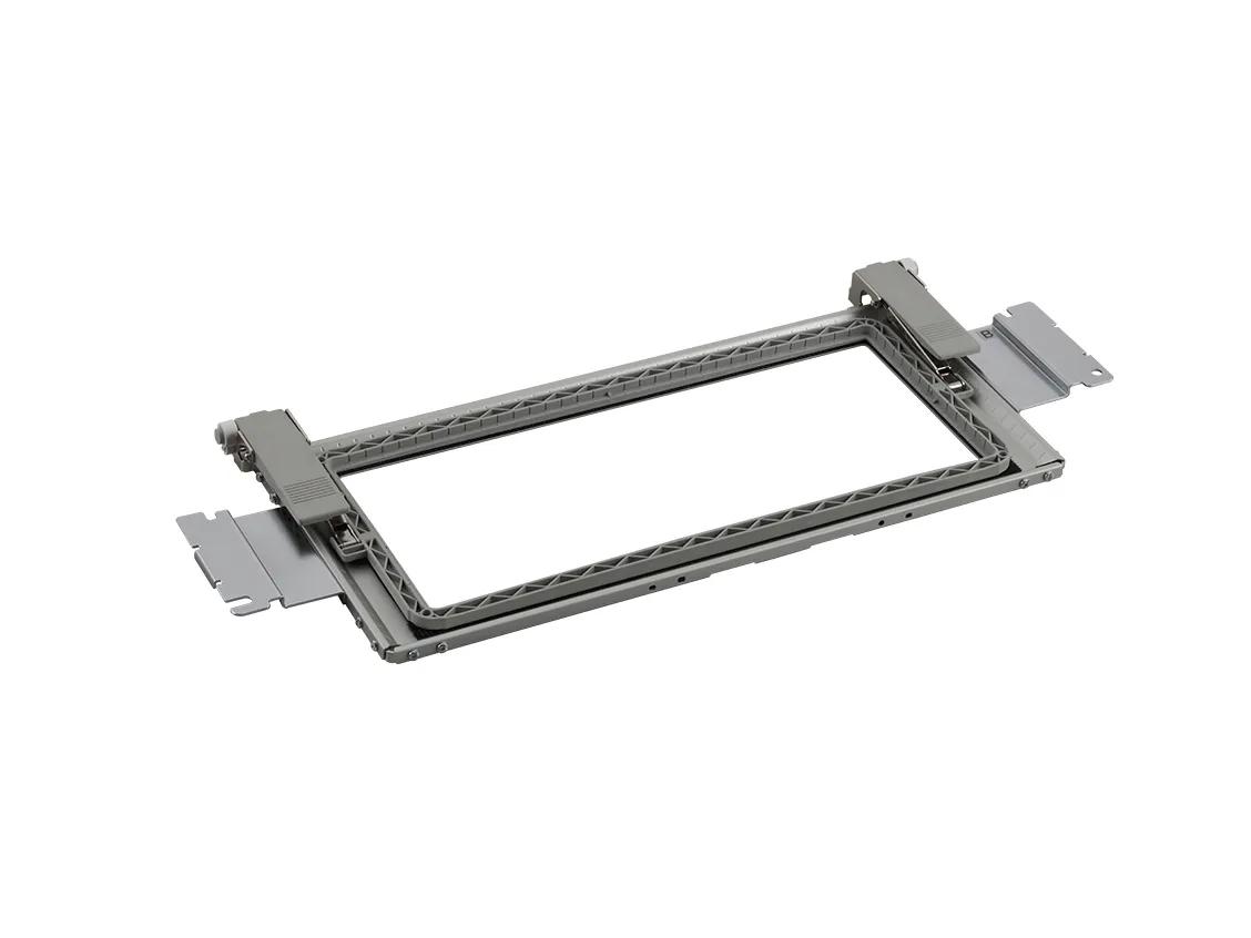 Brother embroidery frame accessory with adjustable clamps on white background