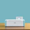 Brother ScanNCut DX electronic cutting machine with touchscreen display in white and aqua