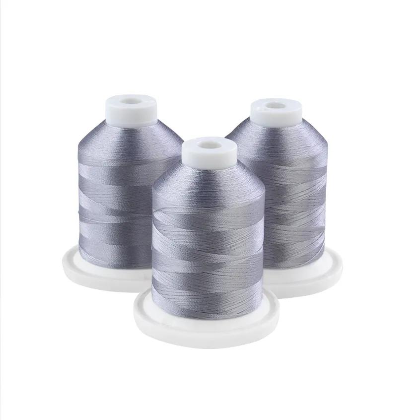 Three silver embroidery thread spools on white bases for Brother sewing machines