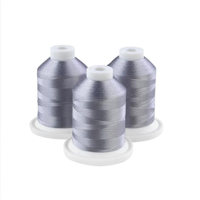 Three silver embroidery thread spools on white bases for Brother sewing machines