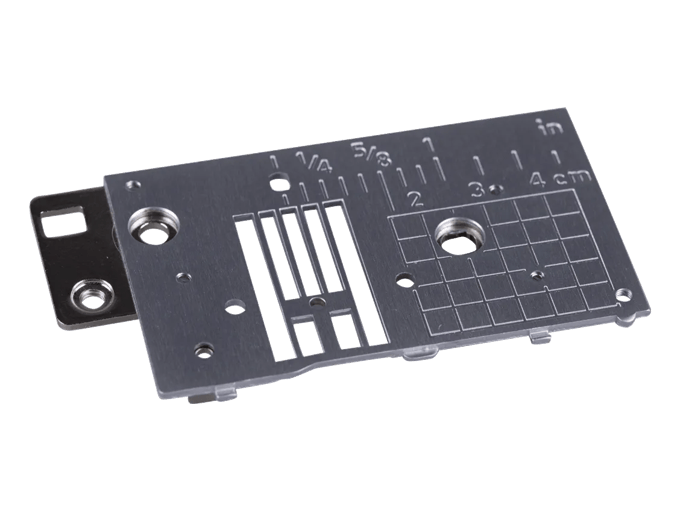 Brother sewing machine needle plate with measurement markings and stitch slots
