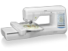 Brother VE2200 embroidery machine with touchscreen and embroidery hoop displaying floral design