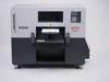 Brother GTX600 direct-to-garment printer with digital control panel and open print bed